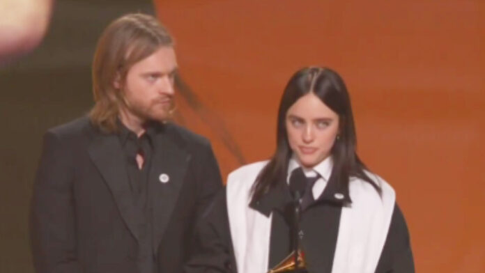 Billie Eilish Sparks Standing Ovation at Grammys With Fiery Immigration Message Billie Eilish Sparks Standing Ovation at Grammys With Fiery Immigration Message